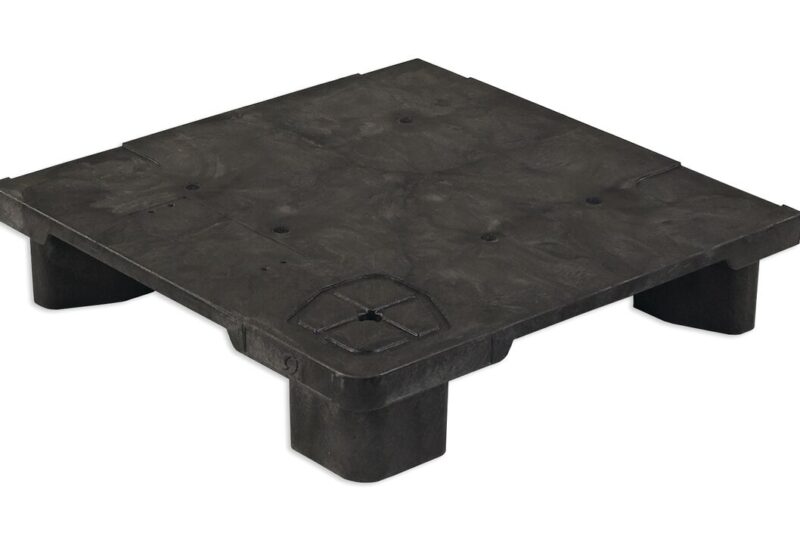 A black plastic square on a white background, resembling a plastic pallet.