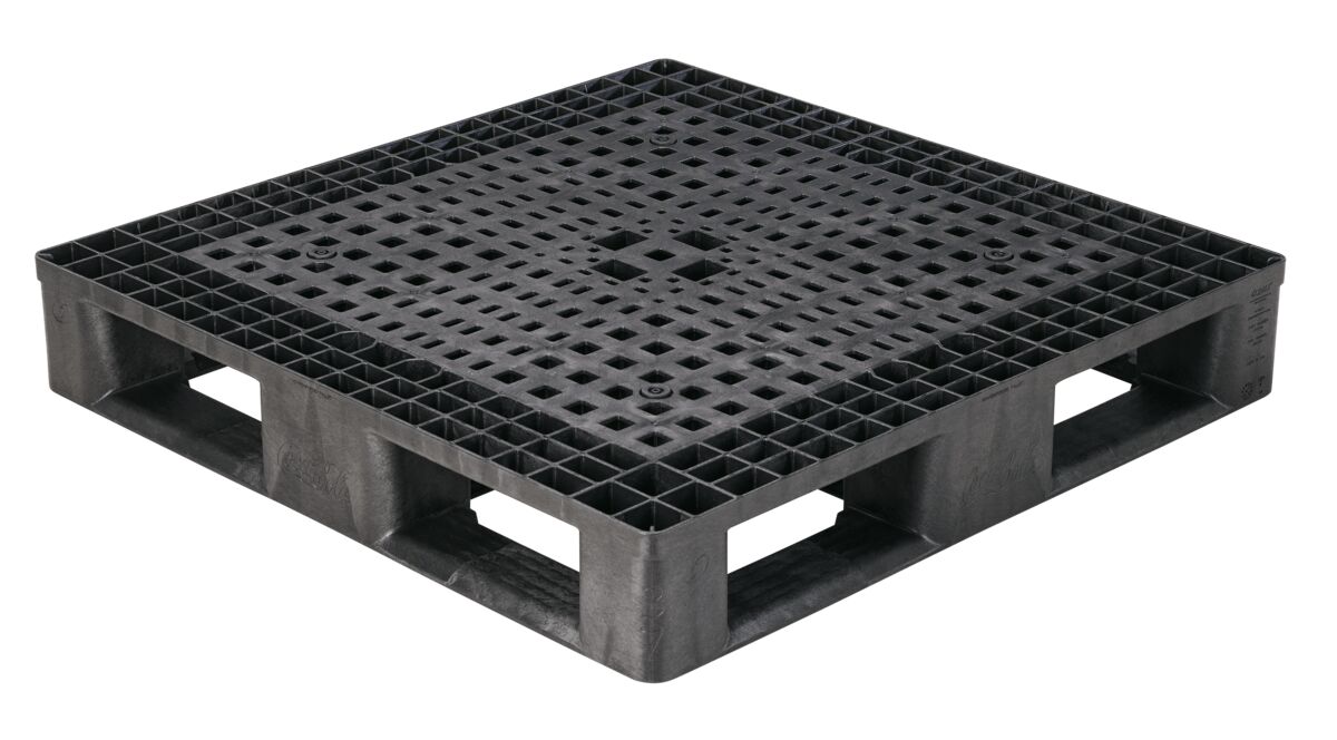 A black plastic pallet with holes.