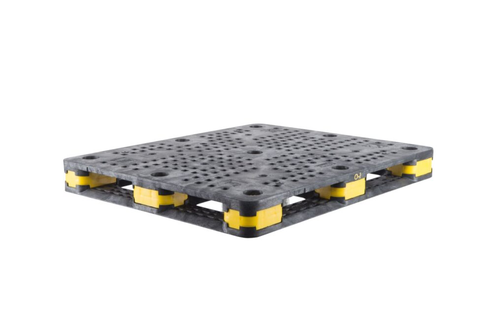 A black plastic pallet on a white background.