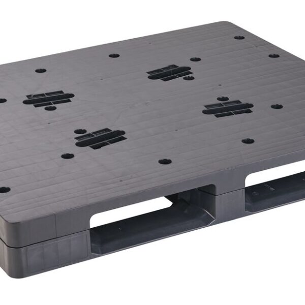 A black plastic pallet with ventilation holes, handle cutouts, and a closed deck, seen against a white background. This 40 x 48 ODYSSEY HD CLOSED DECK model offers durability and functionality.