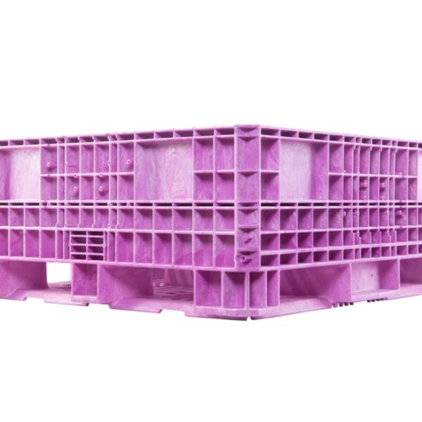 A collapsible pink plastic bulk bin