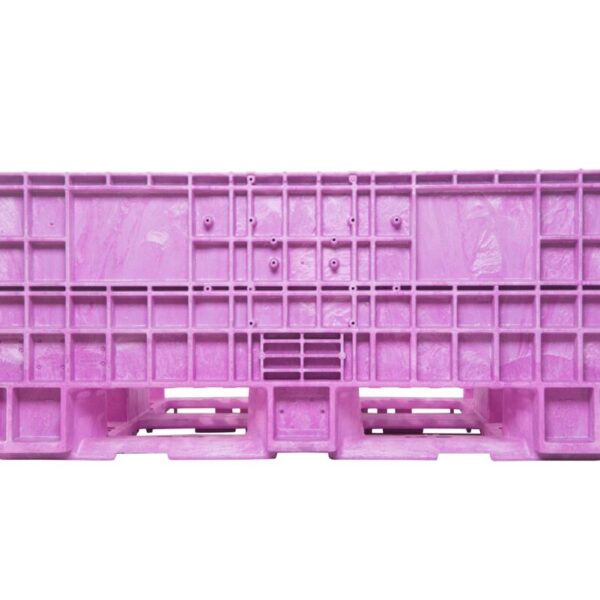 A collapsible pink plastic bulk bin