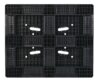 A black plastic pallet tray with four holes.