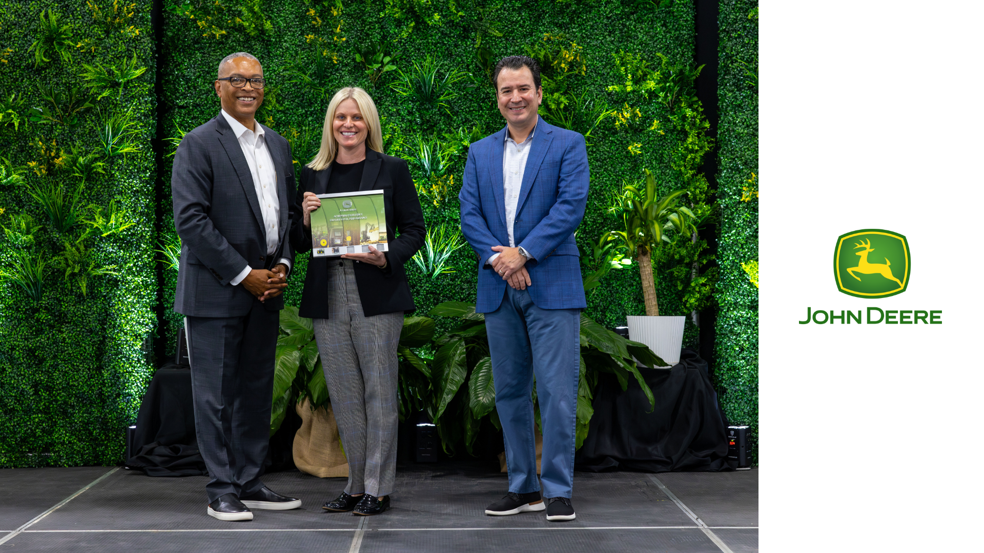 "Partner Level Supplier award presented to ORBIS Corporation's Megan Mahoney, vice president, Industrial Strategic Sales (Center) by Wallas Wiggins, vice president, Global Supply Management & Logistics (Photo Left) and Eduardo Viera, director, Indirect Materials & Services (Photo Right) both of Deere & Company. The award was presented on April 11 in Moline, Illinois.